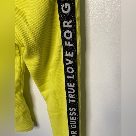 Neon green top with letter detailing on the sleeves - Picture 3 of 3